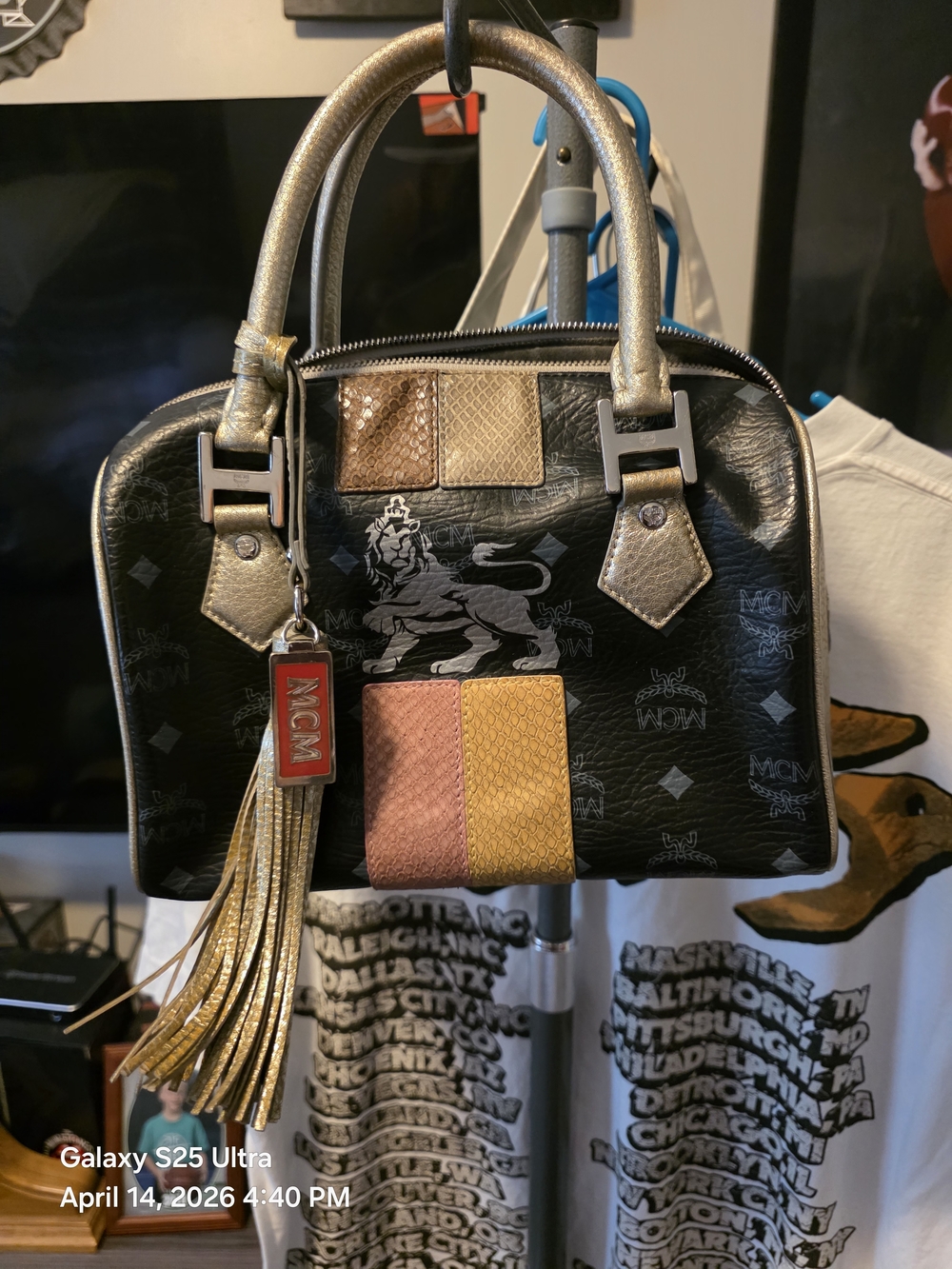 SOLD)))MCM Metallic Black Leather Small/Med Boston Bag W/ Gold and Pink Accents.